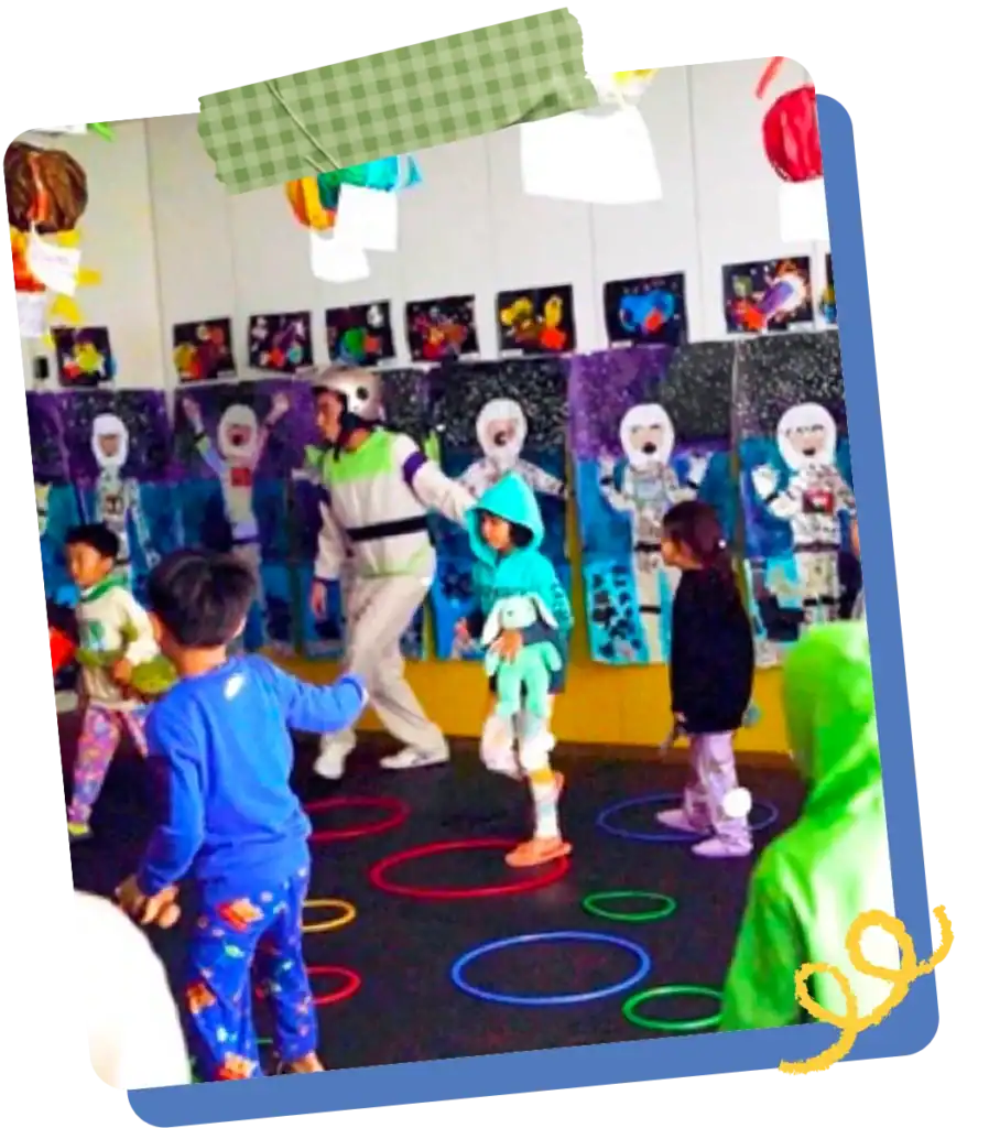 Children engaged in a fun floor activity using colorful hoops at Creative Play Corner